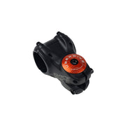 orange headset top cap with a black bolt with uberbike branding on a white background