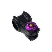 purple headset top cap with a gold bolt with uberbike branding on a white background