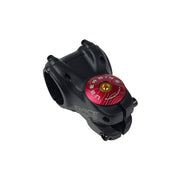 red headset top cap with a gold bolt with uberbike branding on a white background