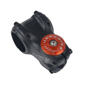 orange headset top cap in a stem on a white background