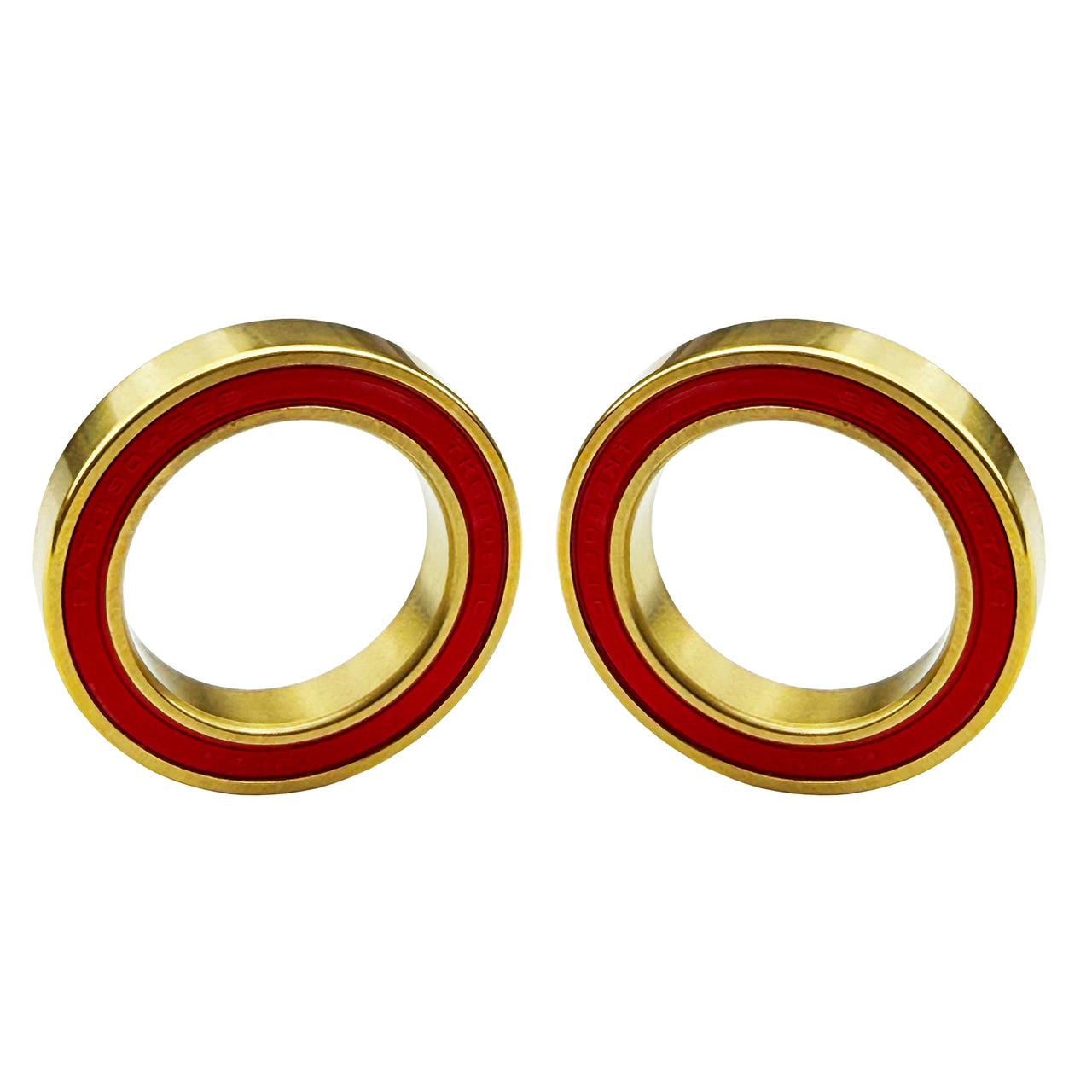 Two gold-toned ceramic bottom bracket bearing for Hollowtech 2 with a red inner ring, shown side by side on a plain white background