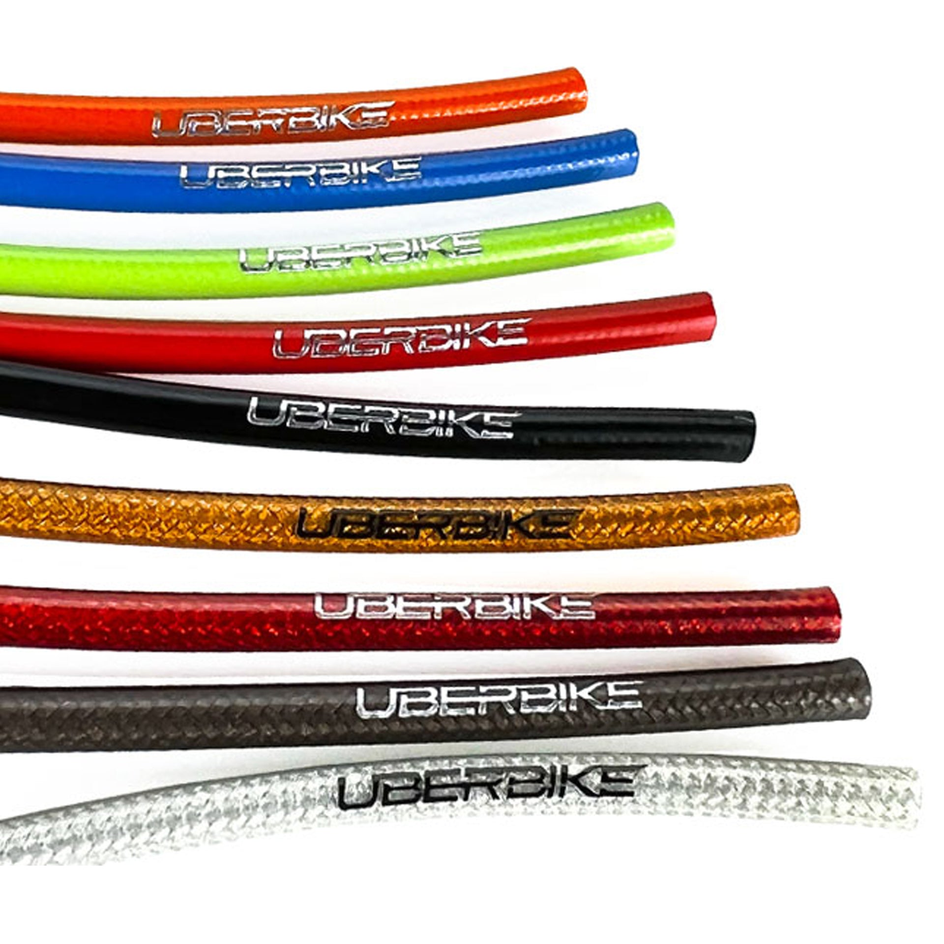 Various replacement brake hoses for hydraulic braking systems, with Uberbike branding on a white background