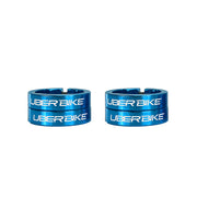 Four blue bicycle grip lock on rings with 'UberBike' branding on a white background