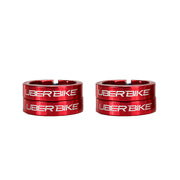 Four red bicycle grip lock on rings with 'UberBike' branding on a white background