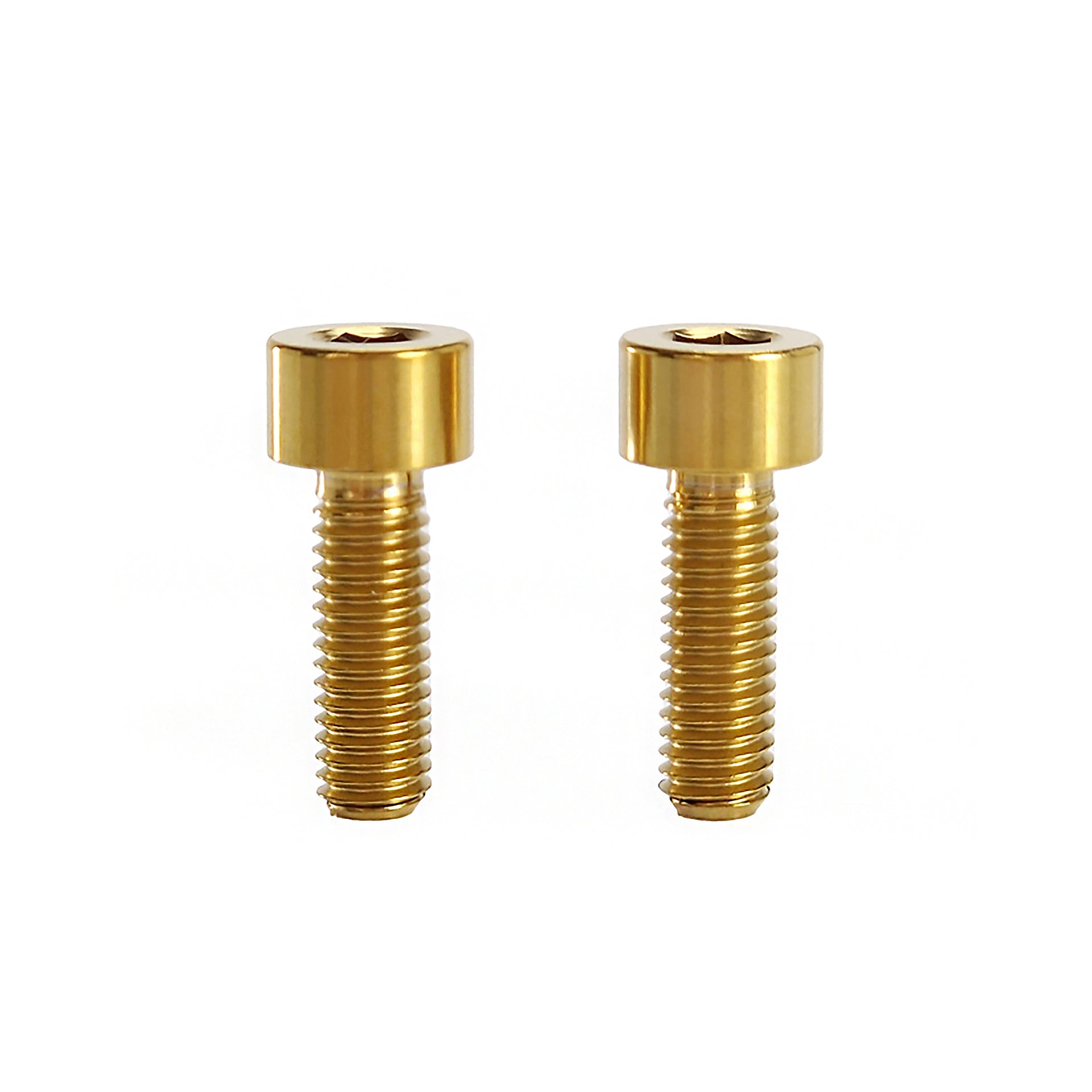 2 gold m5x15 cap head titanium bolts on a white background