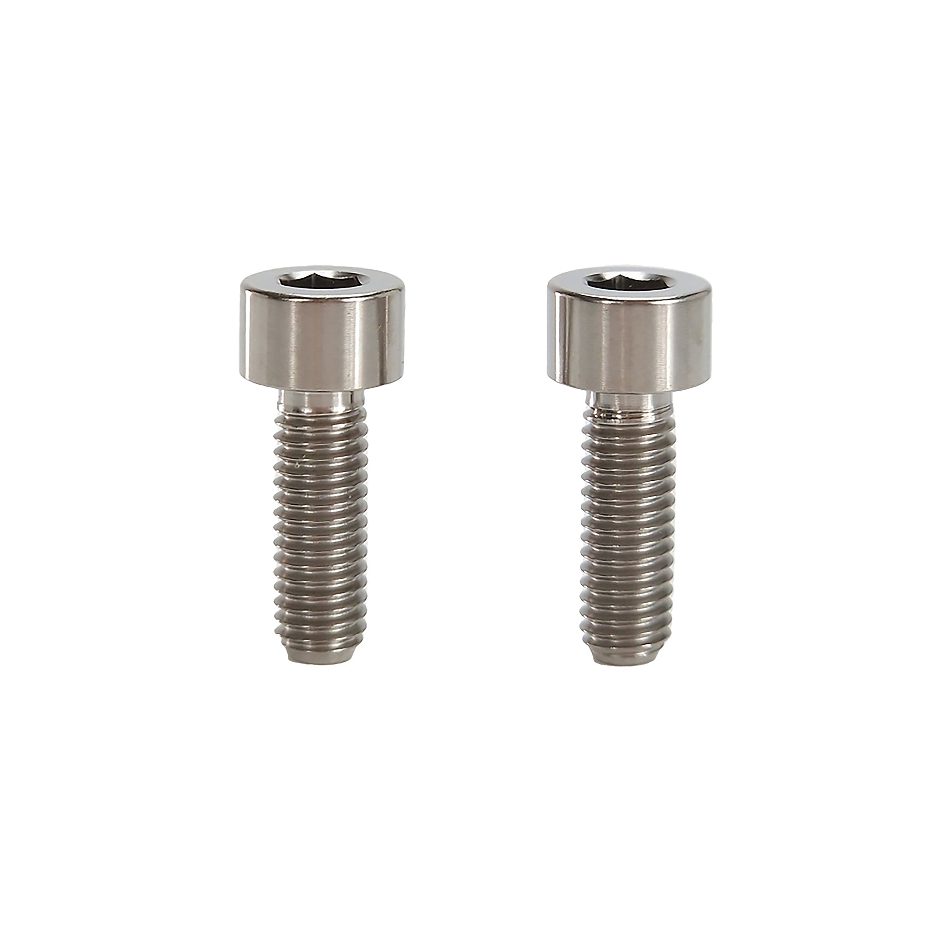 2 raw polsihed m5x15 cap head titanium bolts on a white background