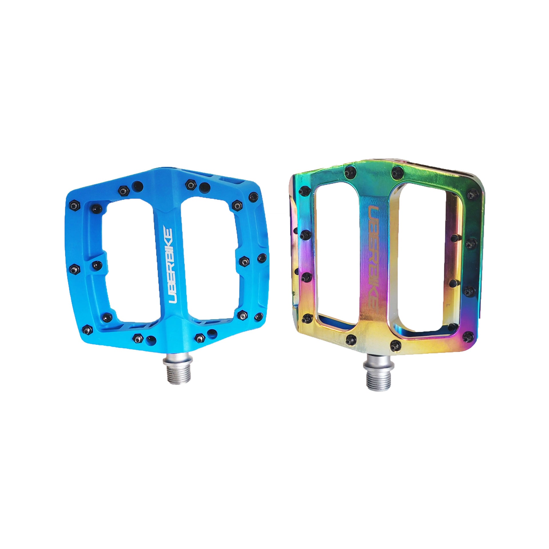 Two bicycle pedals, one blue and one with a rainbow finish, on a white background.