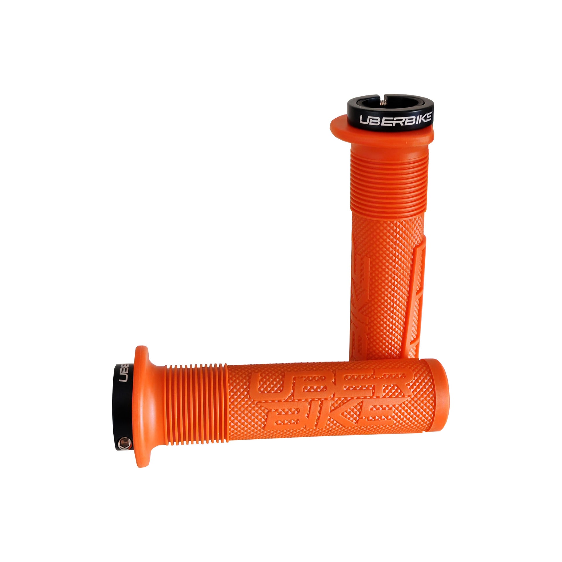 2 orange mushroom mountain bike grips with black lockrings and uberbike branding on a white background