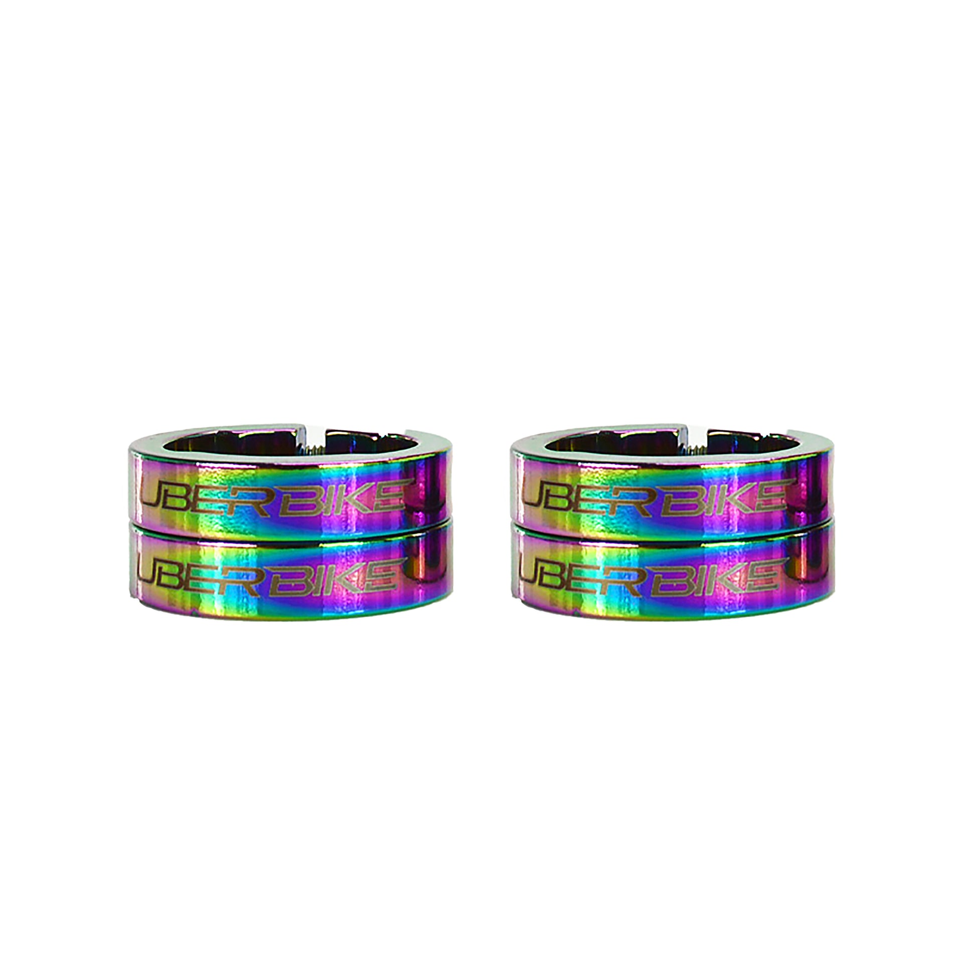 Two pairs of rainbow Uber Bike handlebar grip lockrings on a white background