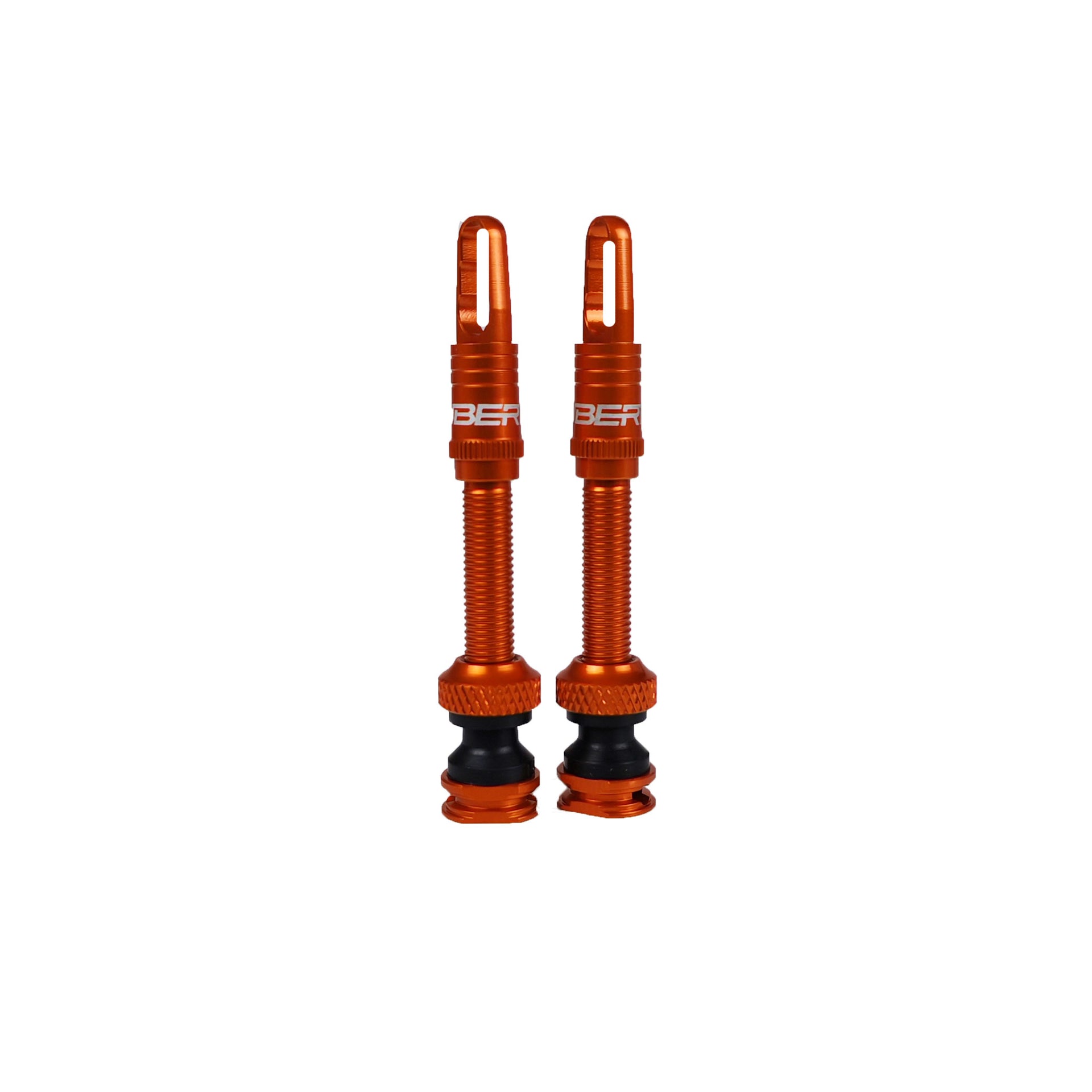 Two orange valves with uberbike branding on a white background