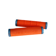 2 orange fat grip mountain bike grips with blue lockrings and uberbike branding on a white background