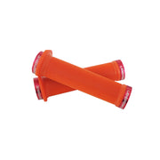 2 orange flange mountain bike grips with red lockrings and uberbike branding on a white background