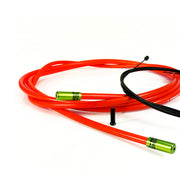 orange gear cable with green sealed ferrules on a white background