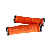 2 orange half waffle mountain bike grips with black lockrings and uberbike branding on a white background