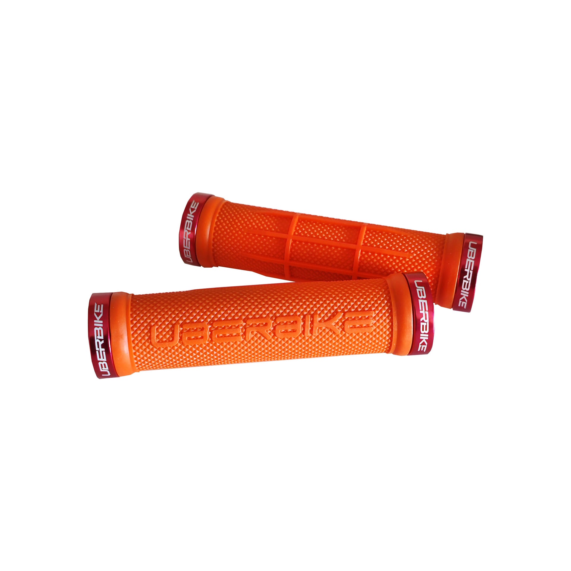 2 orange half waffle mountain bike grips with red lockrings and uberbike branding on a white background