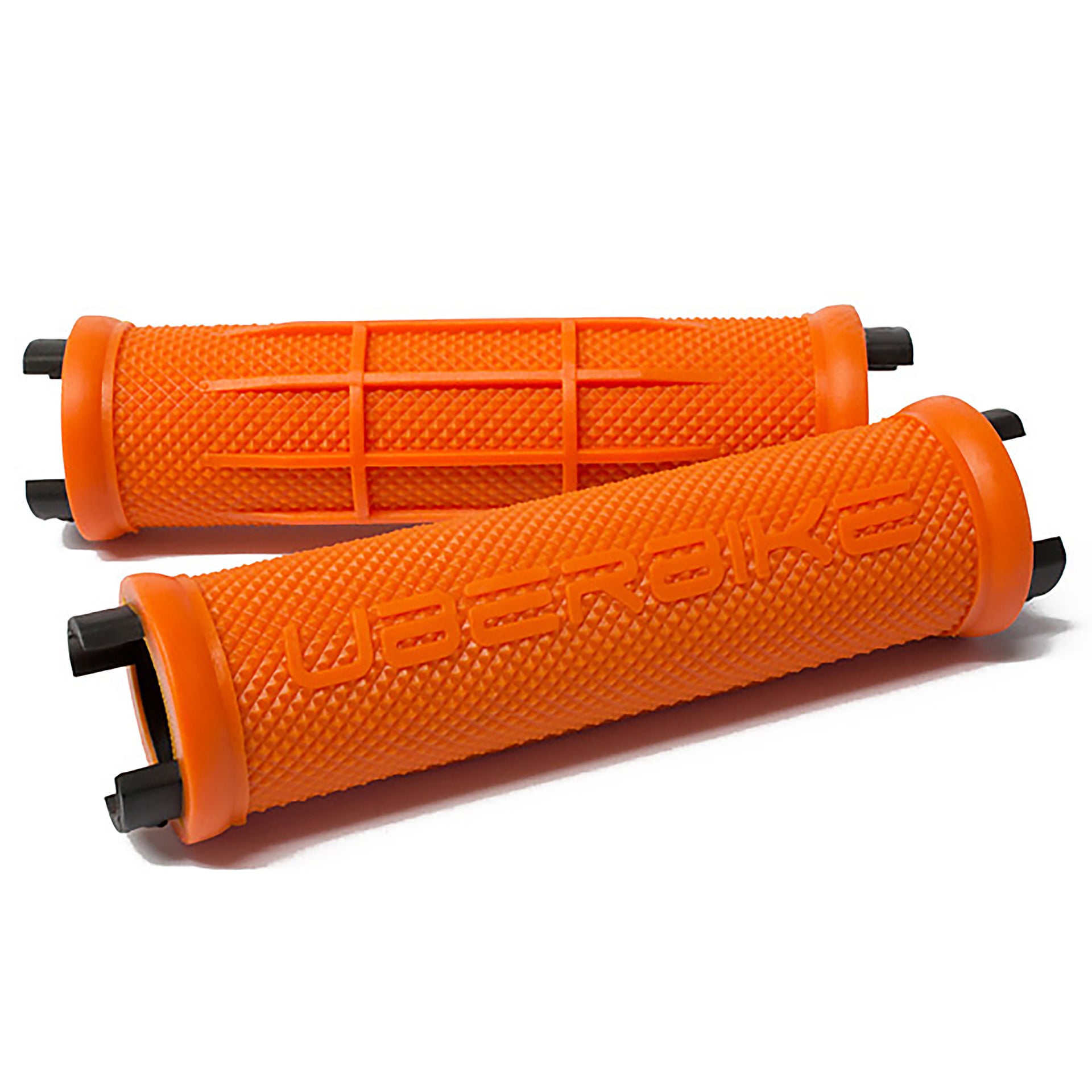 Orange half waffle bicycle grip inserts on a white background