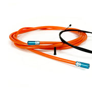 orange road gear cable with blue sealed ferrules on a white background