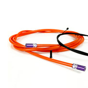 orange road gear cable with purple sealed ferrules on a white background
