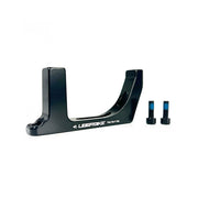 a black post mount flatmount 160 front disc mount adapter with Uberbike branding on a white background