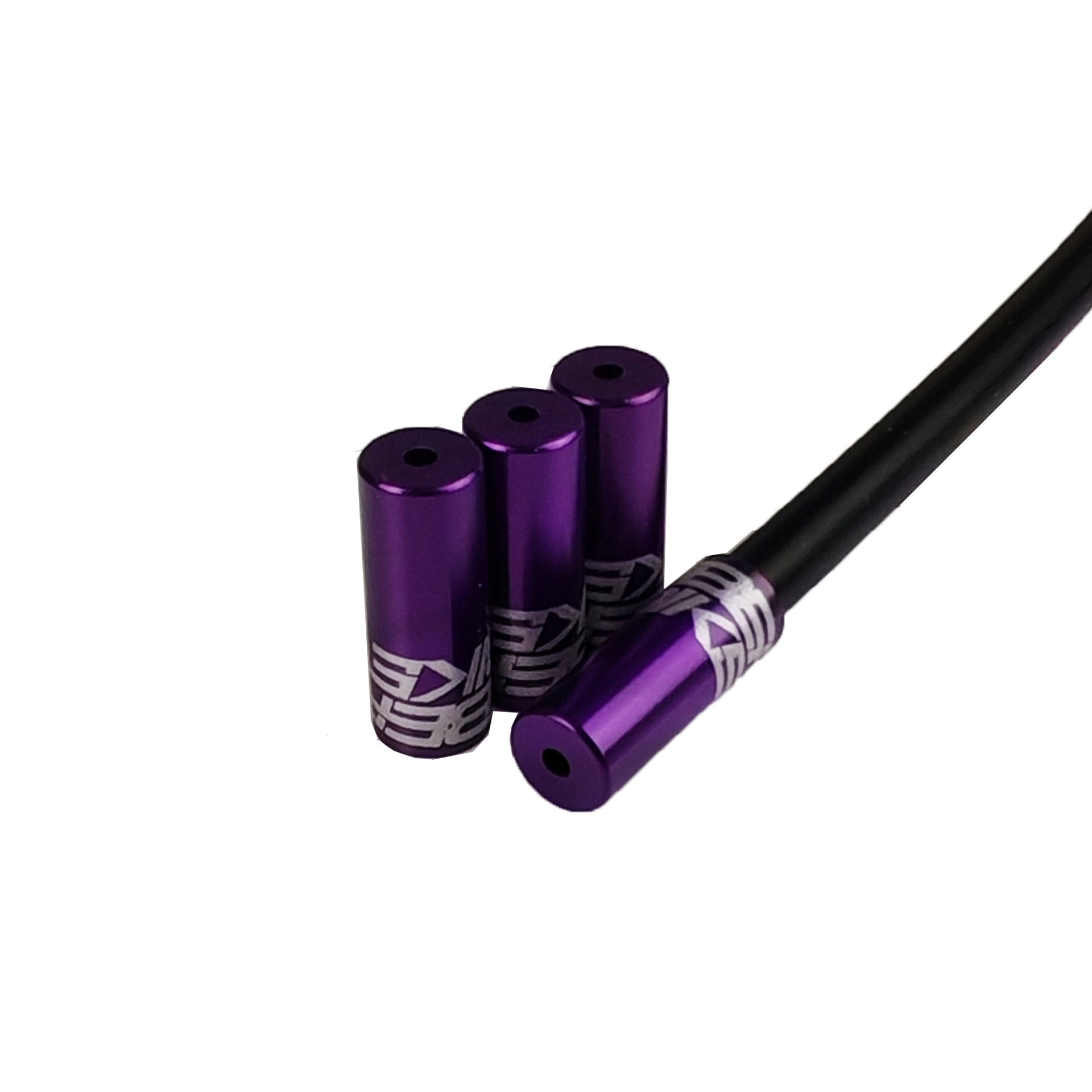 purple Uberbike branded gear ferrules on a white background