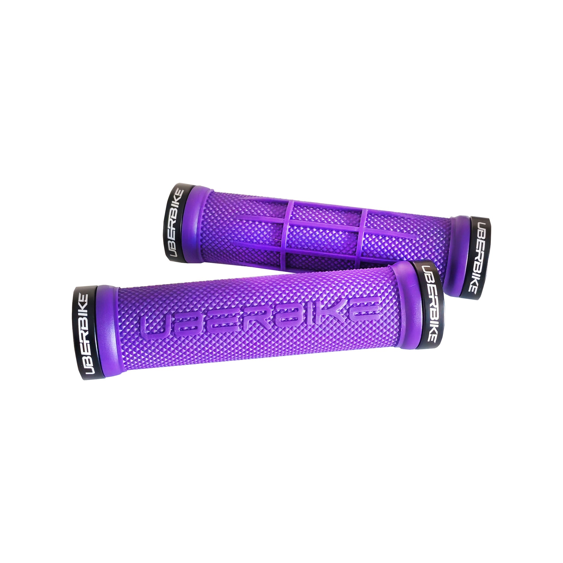 2 purple half waffle mountain bike grips with black lockrings and uberbike branding on a white background