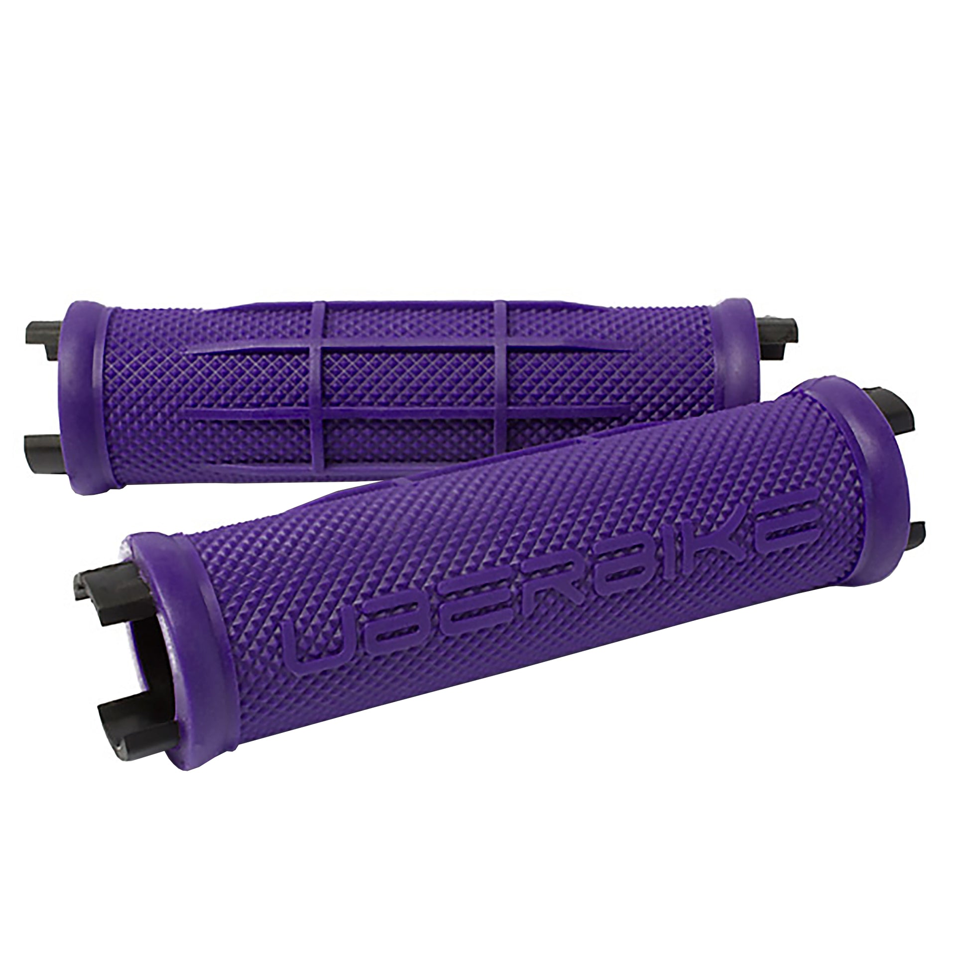 a pair of purple half waffle mountain bike grips on a white background
