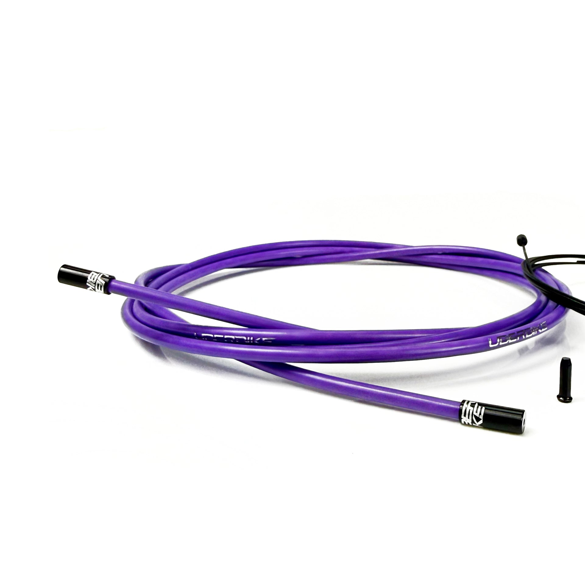 purple road gear cable with black sealed ferrules on a white background