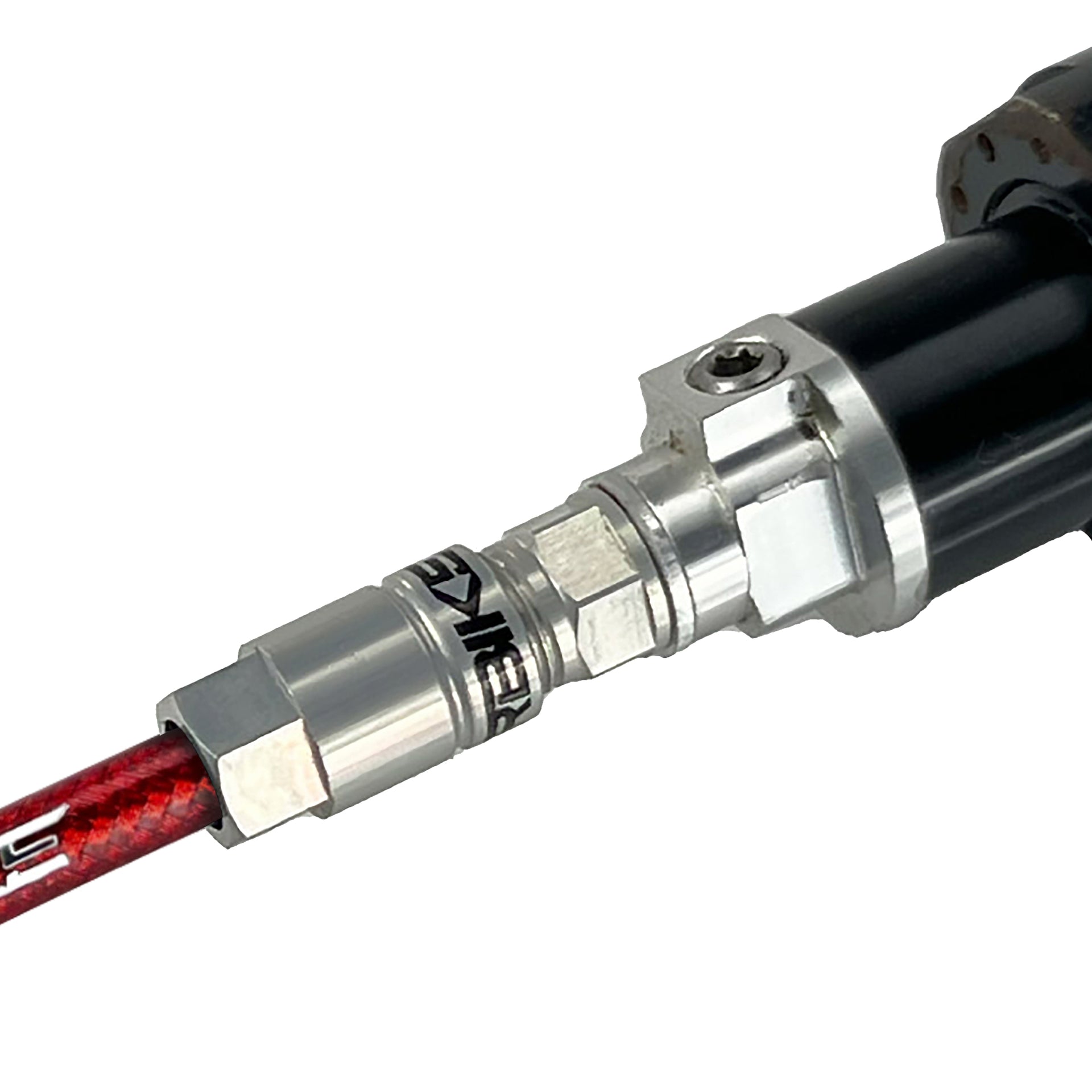 red braid reverb hose installed in a dropper post on a white background