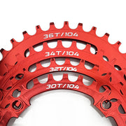 red bicycle chainring with multiple tooth counts on a white background