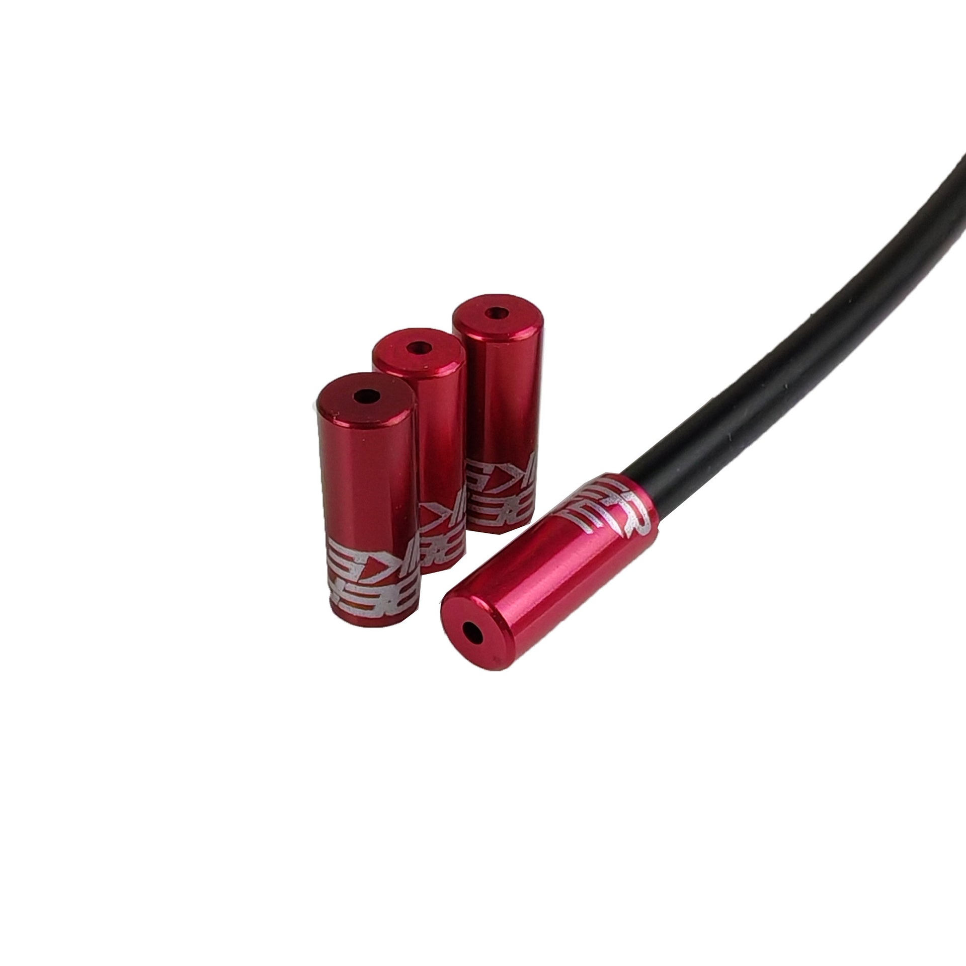 red Uberbike branded gear ferrules on a white background