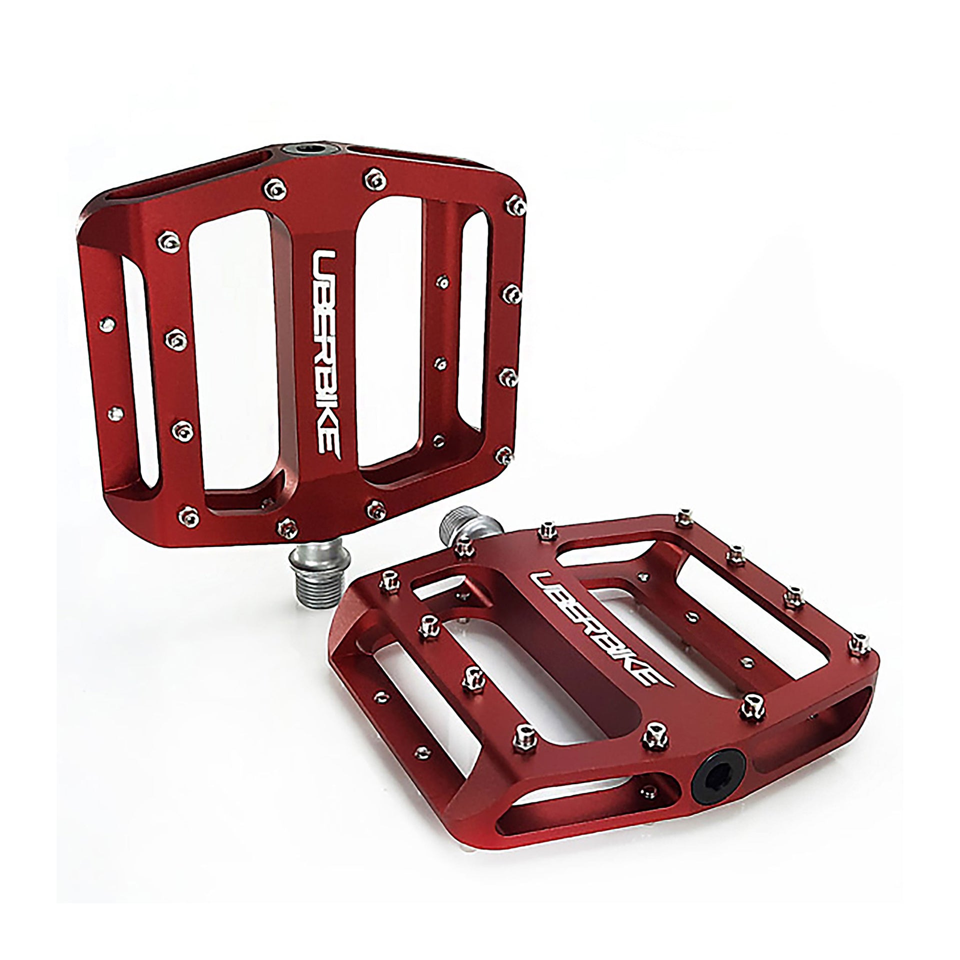 red flatout mtb pedals with Uberbike branding on a white background