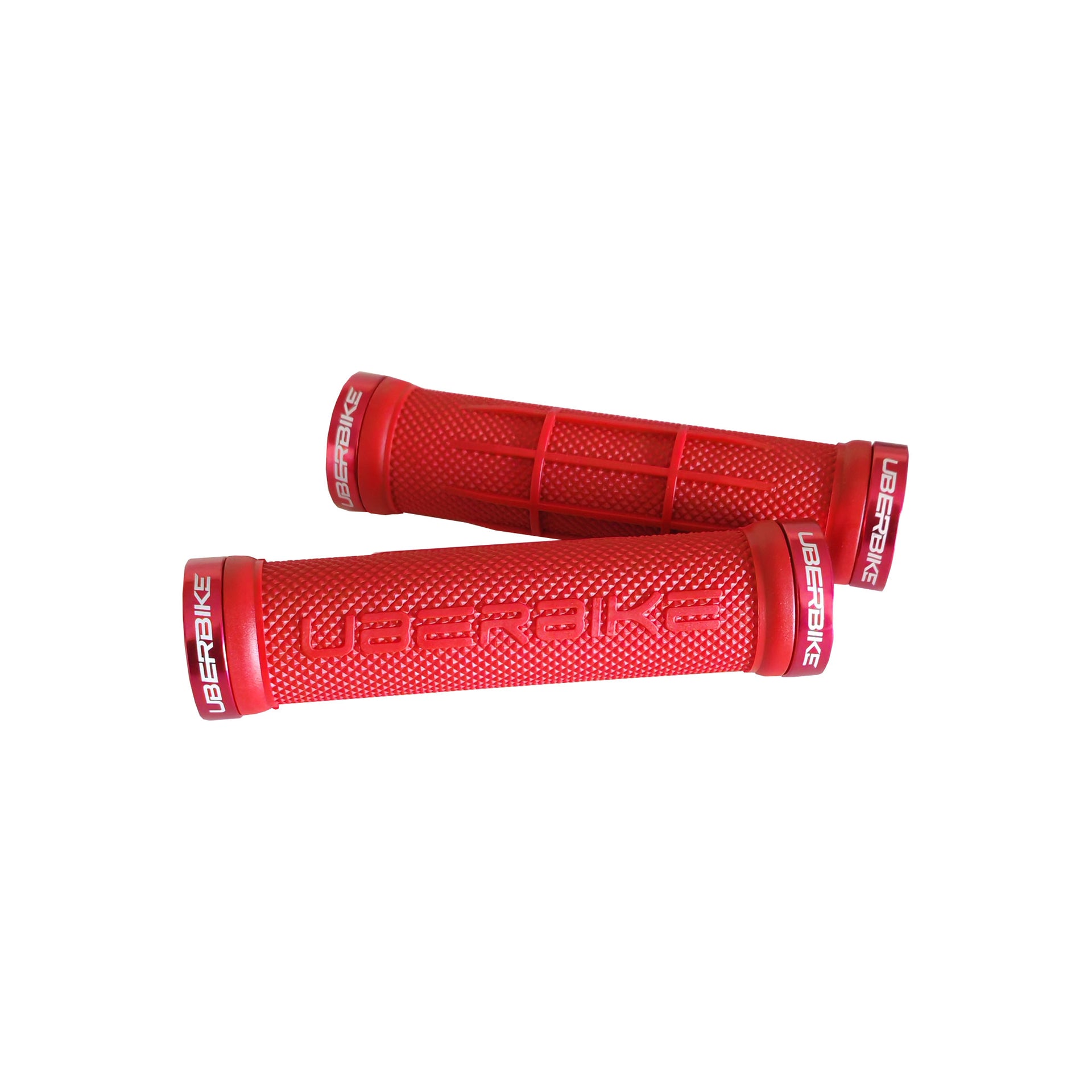 2 red half waffle mountain bike grips with red lockrings and uberbike branding on a white background