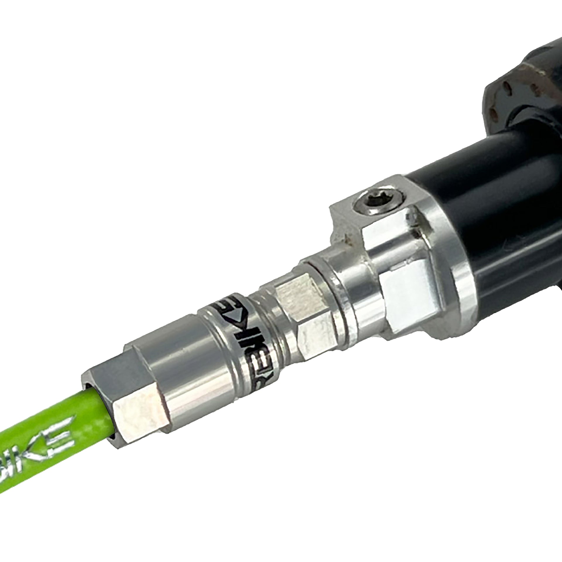 Green reverb hose fitted into dropper post on a white background