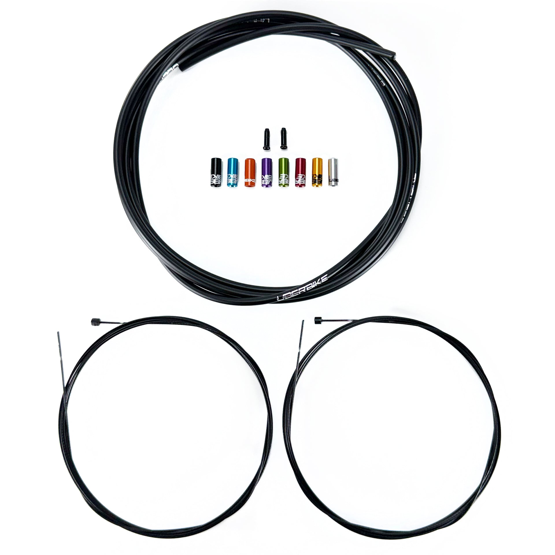 Black road gear cable kit with various ferrules, end caps and gear inner wire on a white background