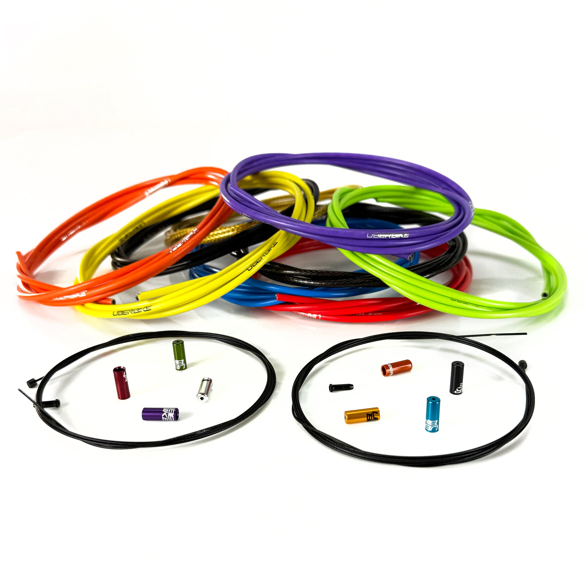 9 different gear cables with gear inner wire and sealed ferrules on a white background