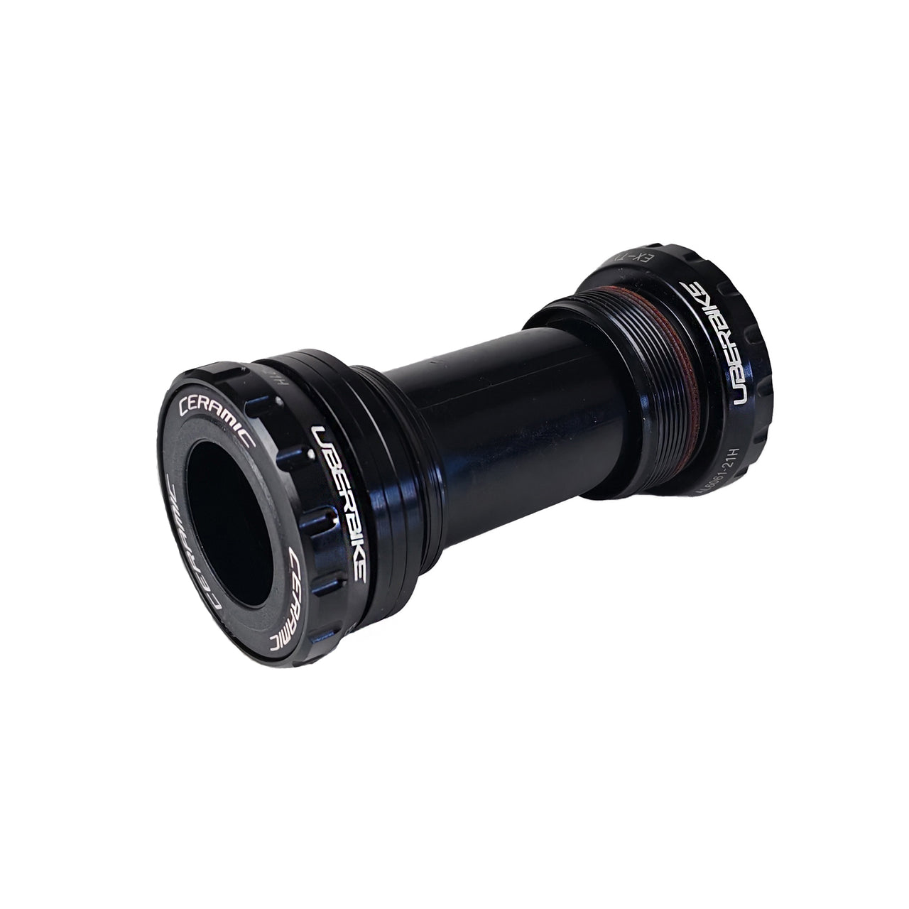 Black Shimano Hollowtech II ceramic bottom bracket with uberbike branding on a white background