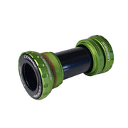 Green Shimano Hollowtech II ceramic bottom bracket with uberbike branding on a white background