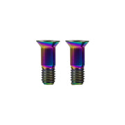 Two rainbow-colored shimano jockey wheel bolts on a white background