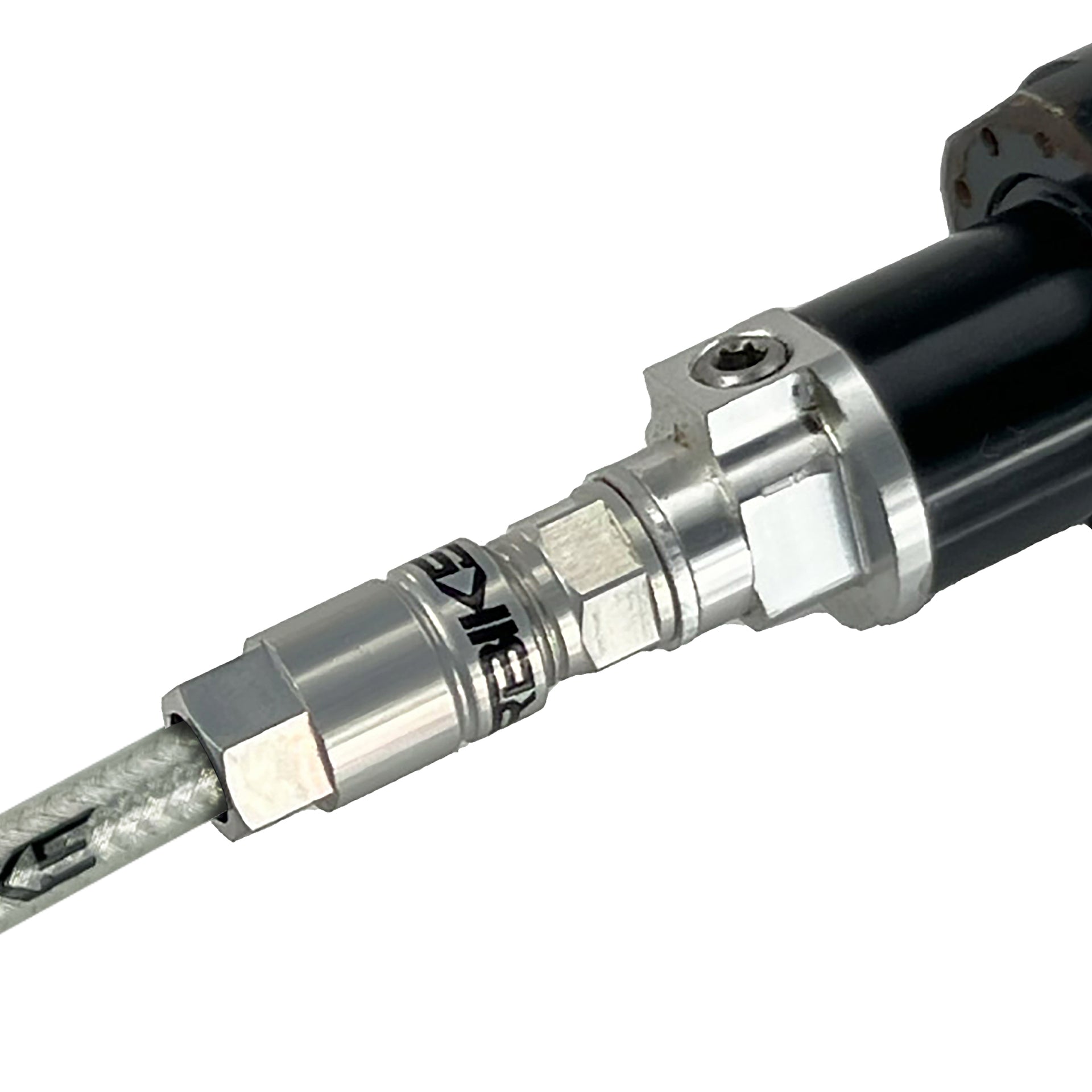 silver braid reverb hose installed in a dropper post on a white background