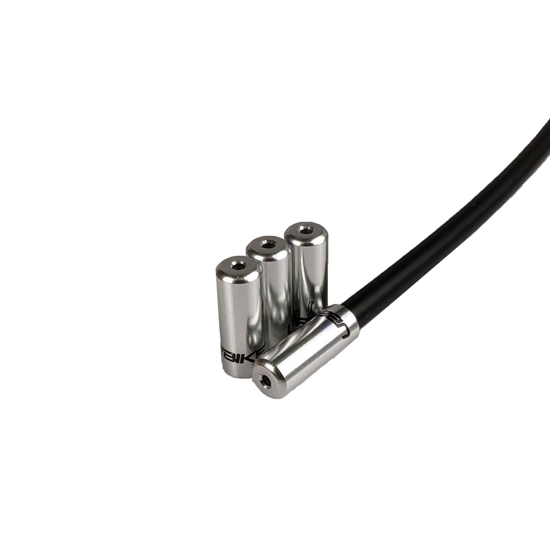 silver Uberbike branded gear ferrules on a white background