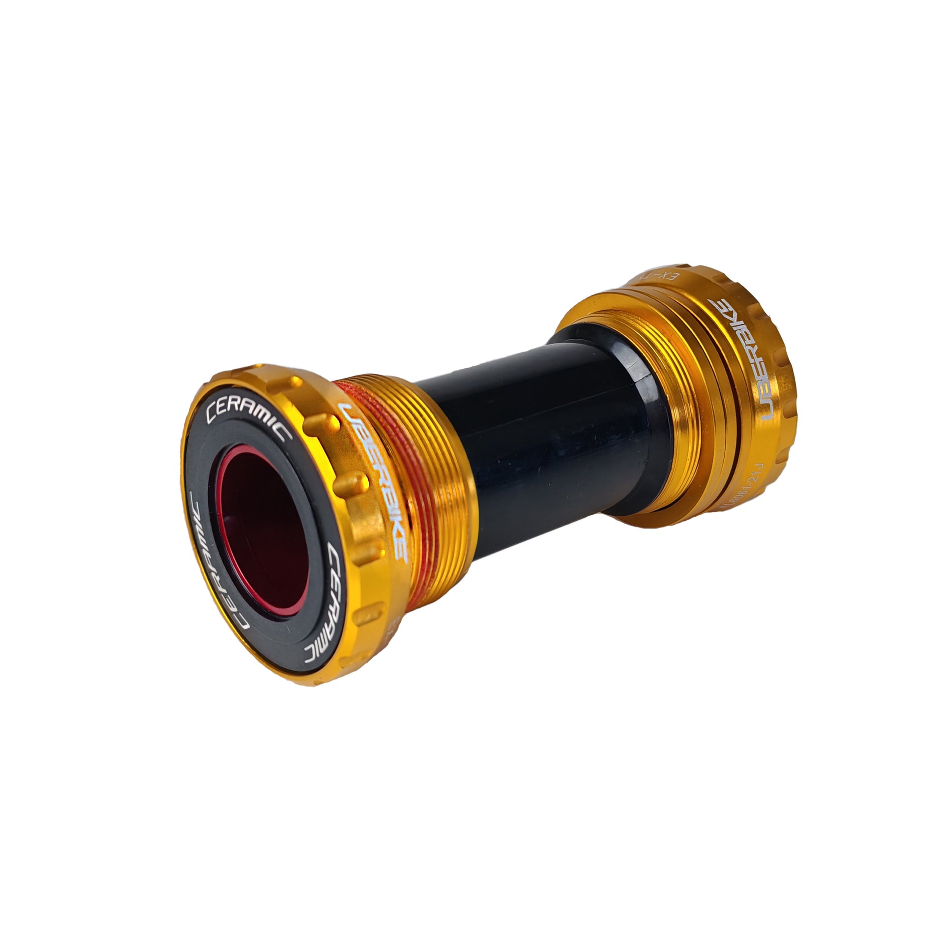 gold sram gxp ceramic bottom bracket with uberbike branding on a white background