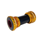 gold sram gxp steel bottom bracket with uberbike branding on a white background