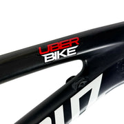 Uberbike stack logo sticker on a bike frame, on a white background